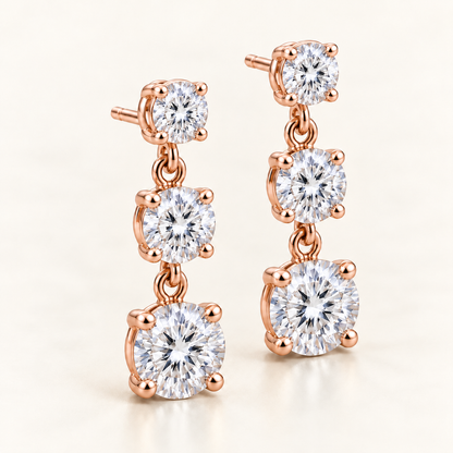 Graduated Three-Stone Lab-Grown Diamond Drop Earrings 3.00 CTW in rose gold, three quarter; design visualization