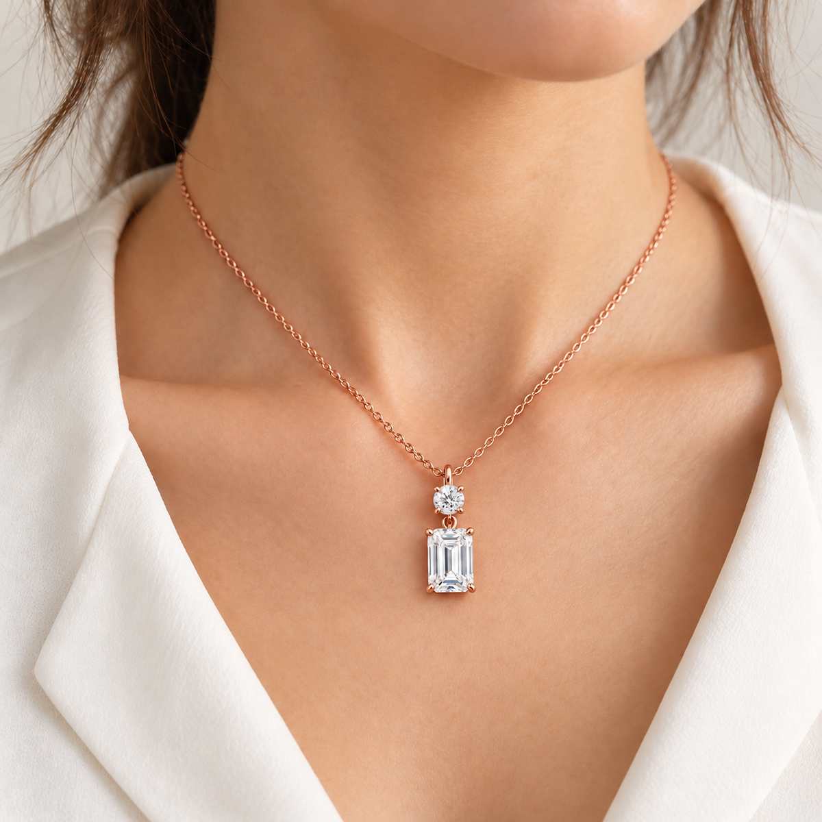 MISSISSI round and emerald-cut lab-grown diamond necklace in rose gold, shown worn at the neckline