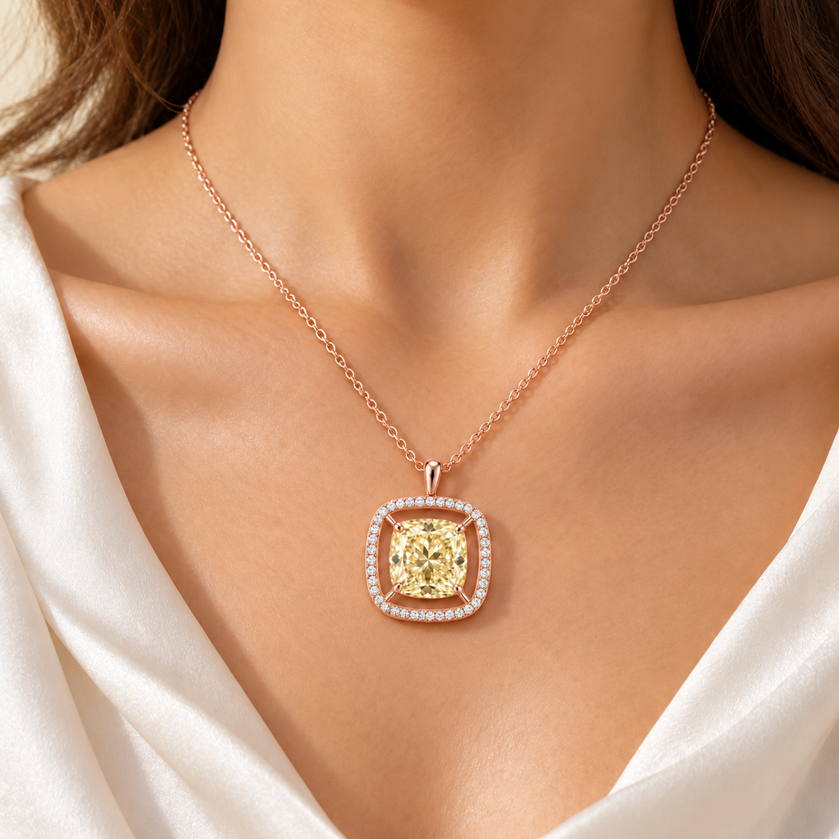 MISSISSI Cushion Air Frame lab-grown diamond necklace in 14K rose gold, natural-scale adult neck wear, featuring a soft-yellow cushion suspended inside a separate white-diamond frame.