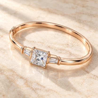 MISSISSI V09 princess-cut lab-grown diamond bangle in rose gold, elevated diagonal view on pale stone; design visualization