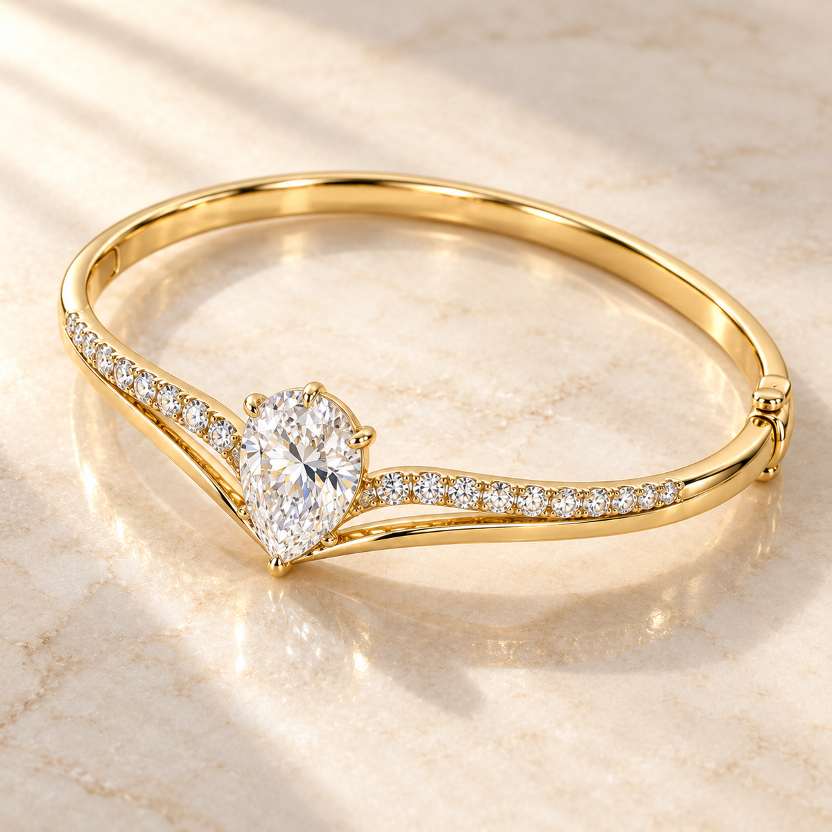 MISSISSI Pear V-Contour Lab-Grown Diamond Bangle in yellow gold, elevated angled view; design visualization