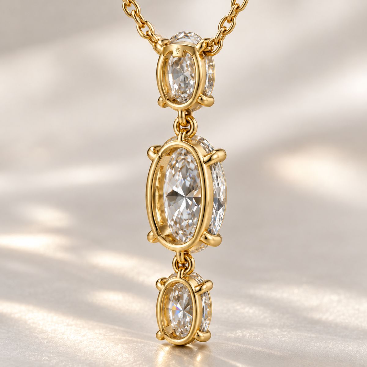MISSISSI Oval Trio Drop Lab-Grown Diamond Necklace in yellow gold, rear-oblique basket view; design visualization