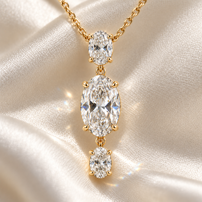 MISSISSI Oval Trio Drop Lab-Grown Diamond Necklace in yellow gold, editorial silk and stone still life; design visualization
