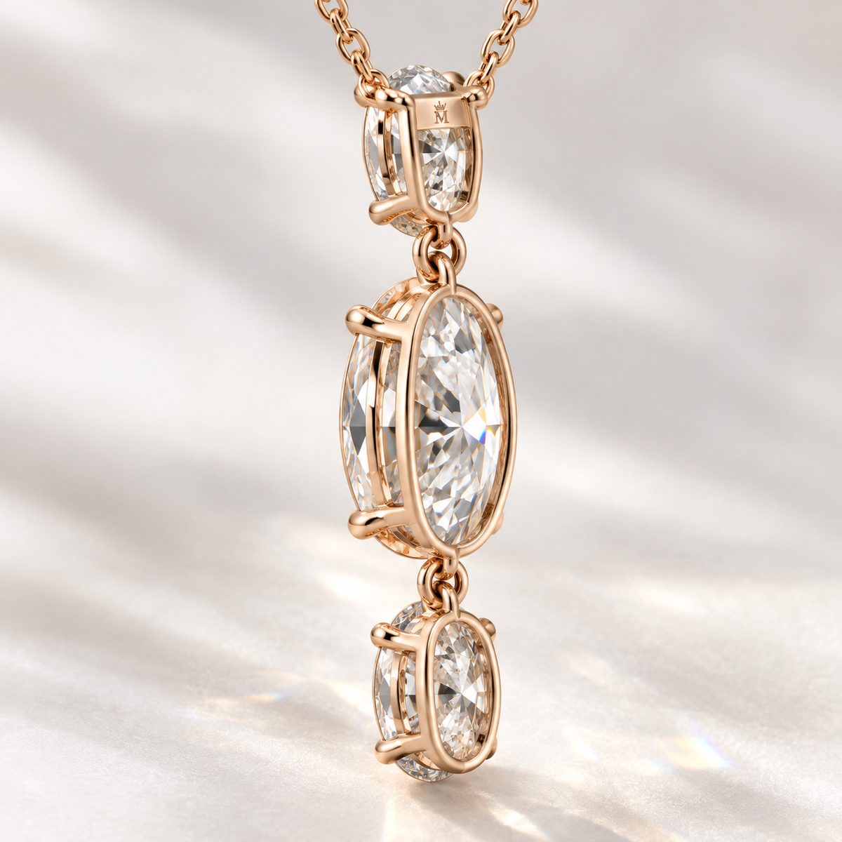 MISSISSI Oval Trio Drop Lab-Grown Diamond Necklace in rose gold, rear-oblique basket view; design visualization