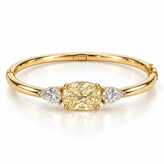 MISSISSI Yellow Oval Pear-Side Lab-Grown Diamond Bangle in yellow gold, front product view on white; design visualization