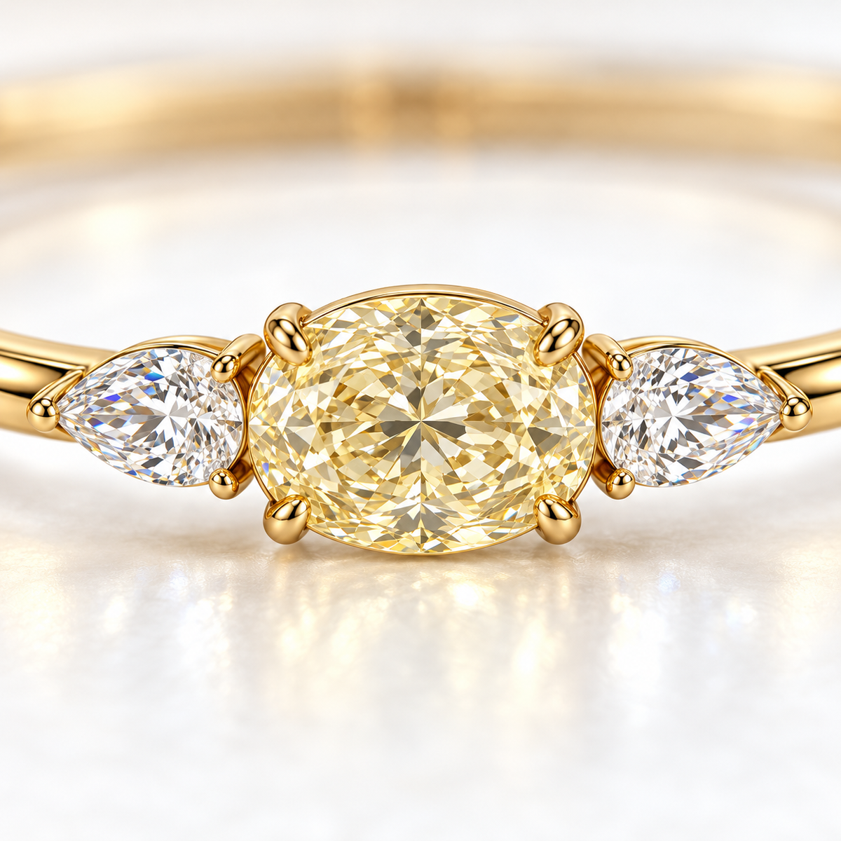 MISSISSI Yellow Oval Pear-Side Lab-Grown Diamond Bangle in yellow gold, close diamond and prong-setting detail; design visualization