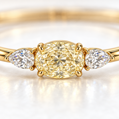 MISSISSI Yellow Oval Pear-Side Lab-Grown Diamond Bangle in yellow gold, close diamond and prong-setting detail; design visualization