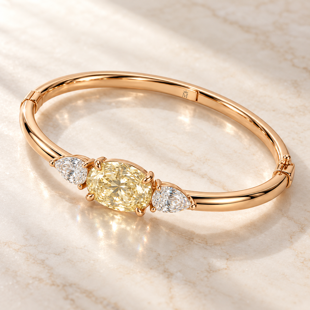 MISSISSI Yellow Oval Pear-Side Lab-Grown Diamond Bangle in rose gold, angled product view on ivory stone; design visualization