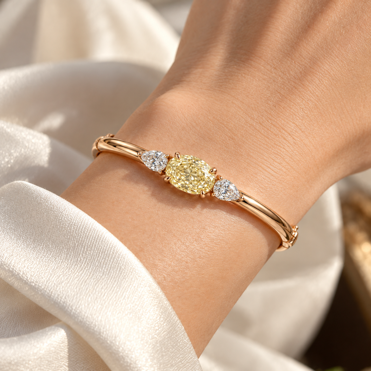 MISSISSI Yellow Oval Pear-Side Lab-Grown Diamond Bangle in rose gold, illustrative on-wrist view; design visualization