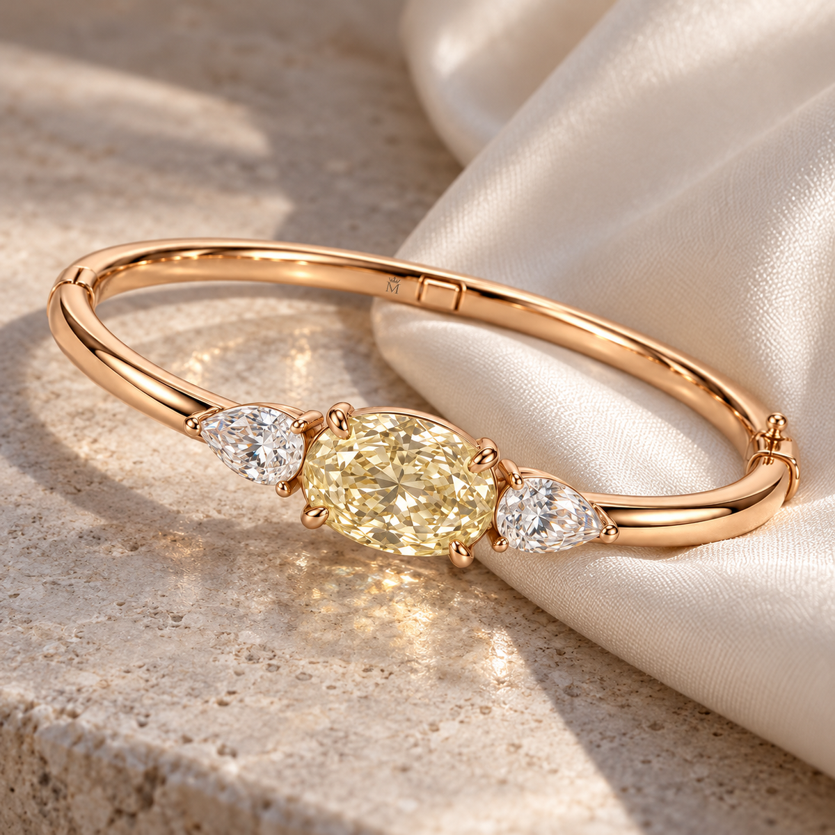 MISSISSI Yellow Oval Pear-Side Lab-Grown Diamond Bangle in rose gold, editorial still life on ivory silk and pale stone; design visualization