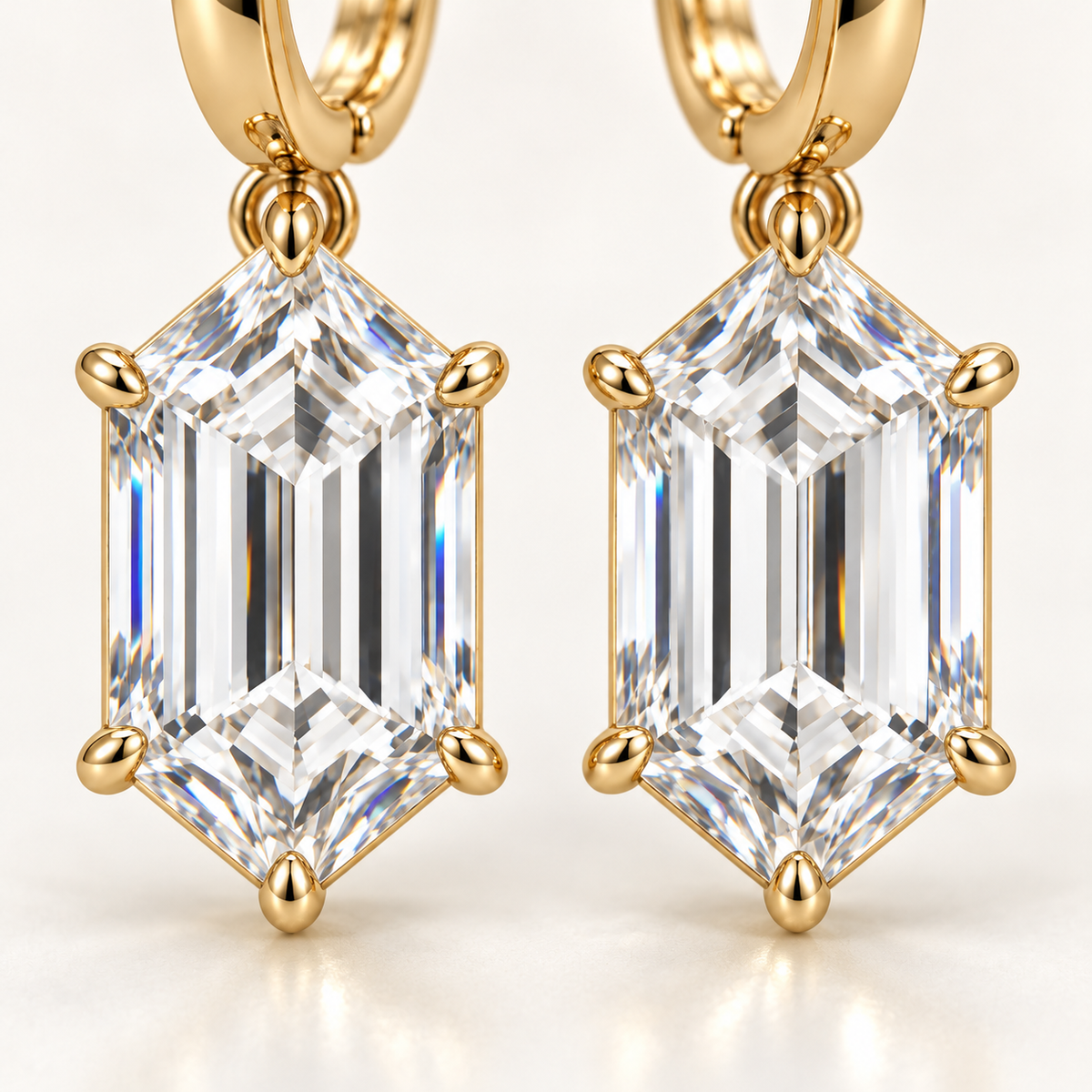 MISSISSI Hexagonal Huggie Drop Lab-Grown Diamond Earrings in yellow gold, macro detail of both six-sided step-cut diamond drops; design visualization
