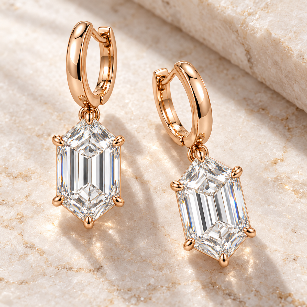 MISSISSI Hexagonal Huggie Drop Lab-Grown Diamond Earrings in rose gold, angled product view on ivory stone; design visualization