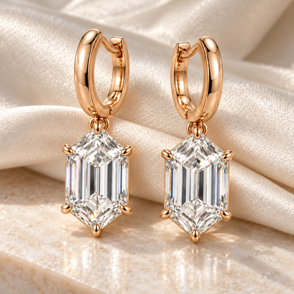 MISSISSI Hexagonal Huggie Drop Lab-Grown Diamond Earrings in rose gold, editorial still life on ivory silk and pale stone; design visualization