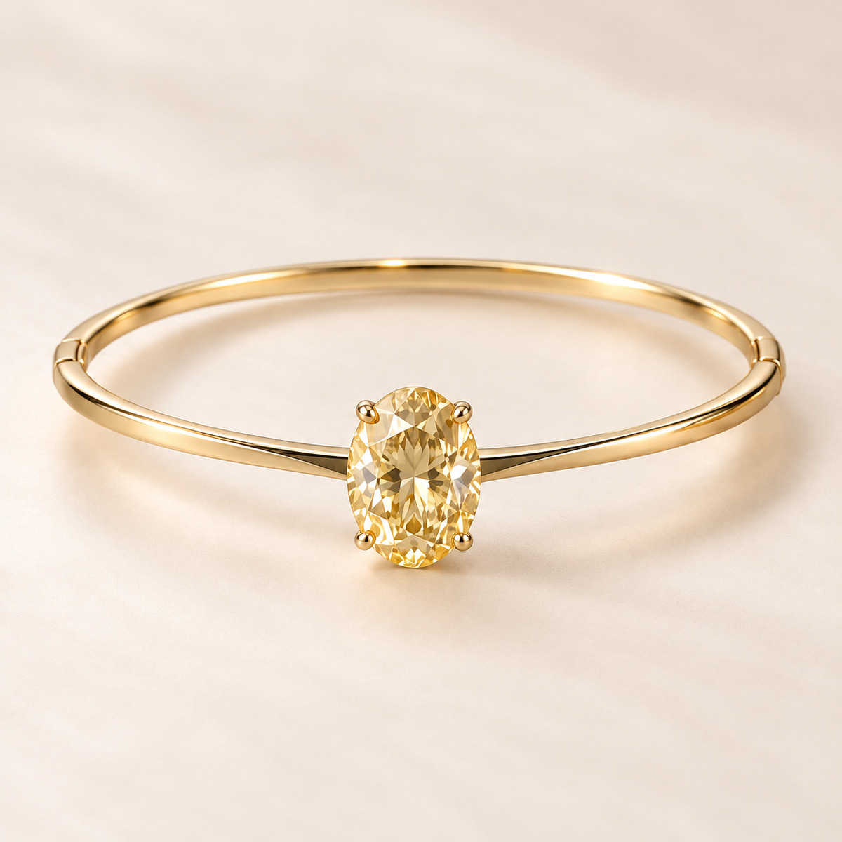 Design visualization of a slender closed bangle with a vertically set oval lab-grown yellow diamond in a four-prong setting