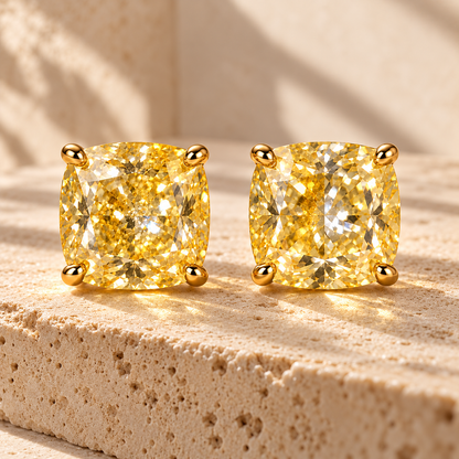 Design visualization of MISSISSI YE01 yellow lab-grown diamond earrings, pair on travertine