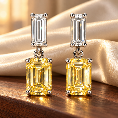 Design visualization of MISSISSI YE02 yellow lab-grown diamond earrings, pair on walnut with silk