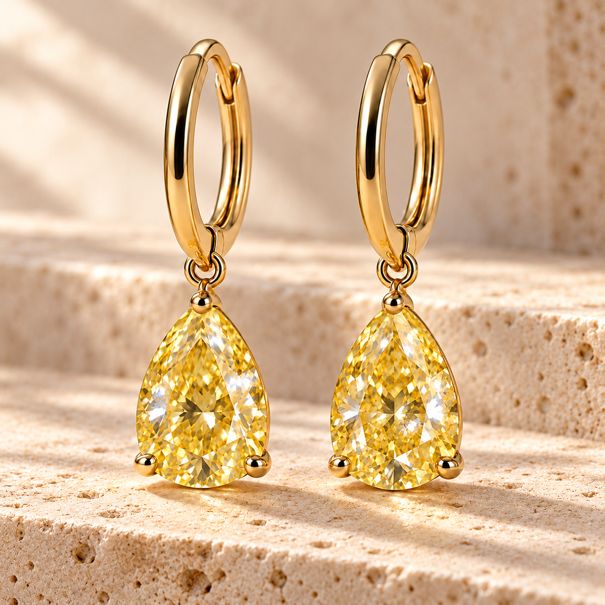 Design visualization of MISSISSI YE03 yellow lab-grown diamond earrings, pair on travertine