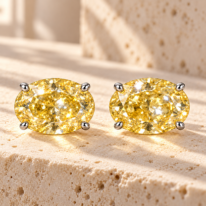 Design visualization of MISSISSI YE04 yellow lab-grown diamond earrings, pair on travertine
