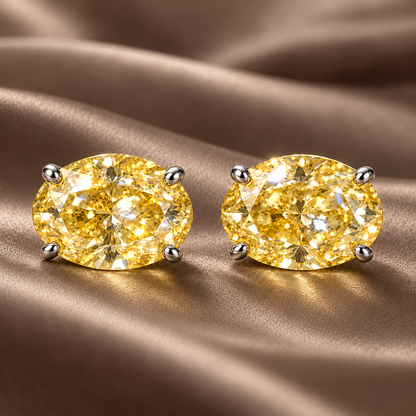 Design visualization of MISSISSI YE04 yellow lab-grown diamond earrings, pair on taupe silk