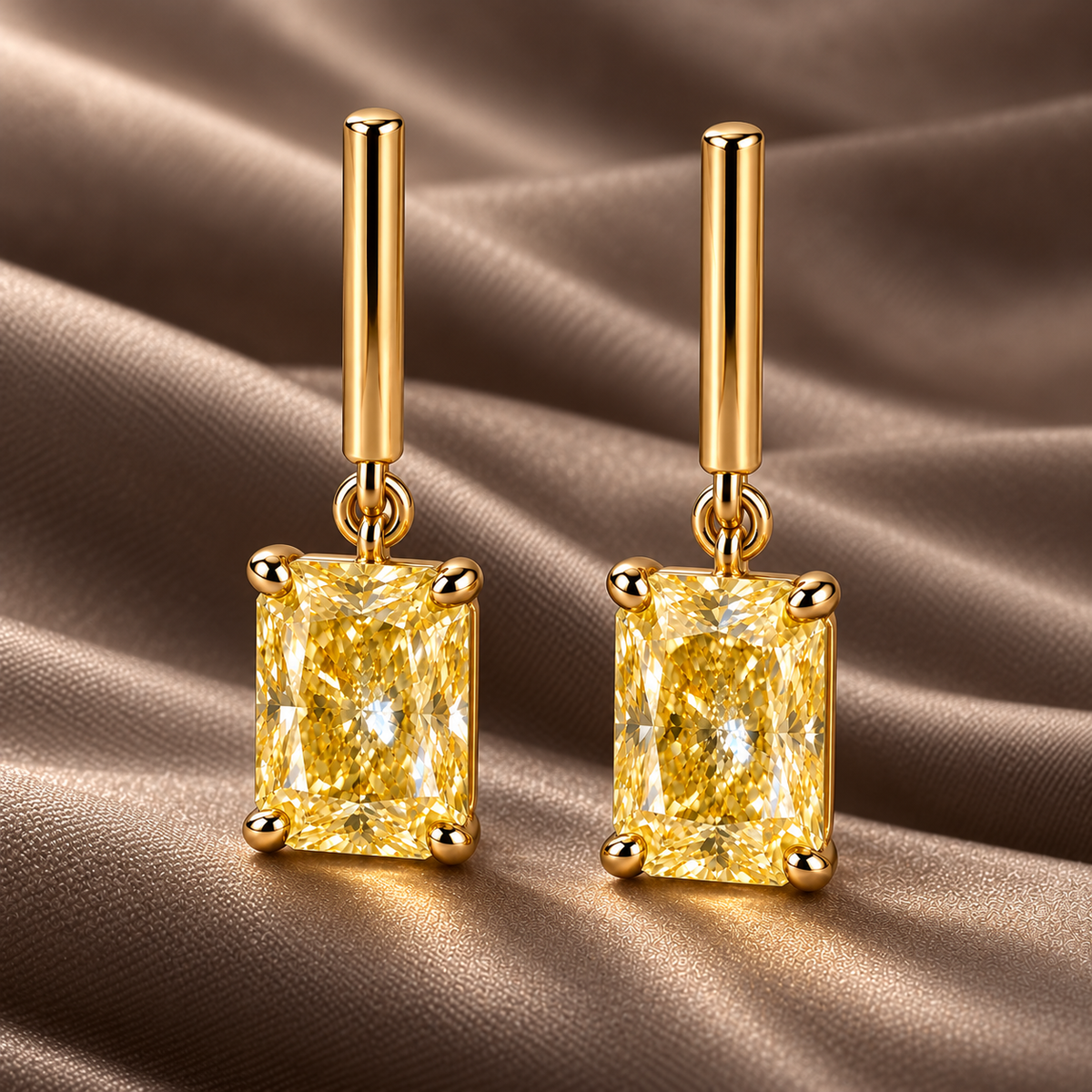 Design visualization of MISSISSI YE05 yellow lab-grown diamond earrings, pair on taupe silk