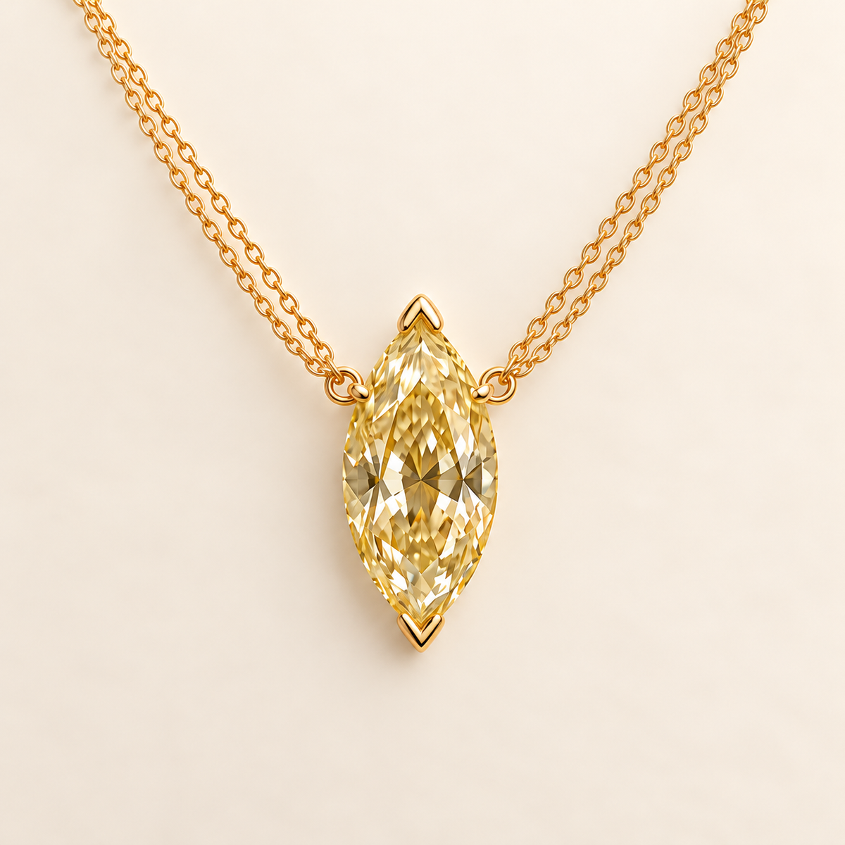 Design visualization of a vertical marquise-cut lab-grown yellow diamond pendant joined to paired chain strands on each side