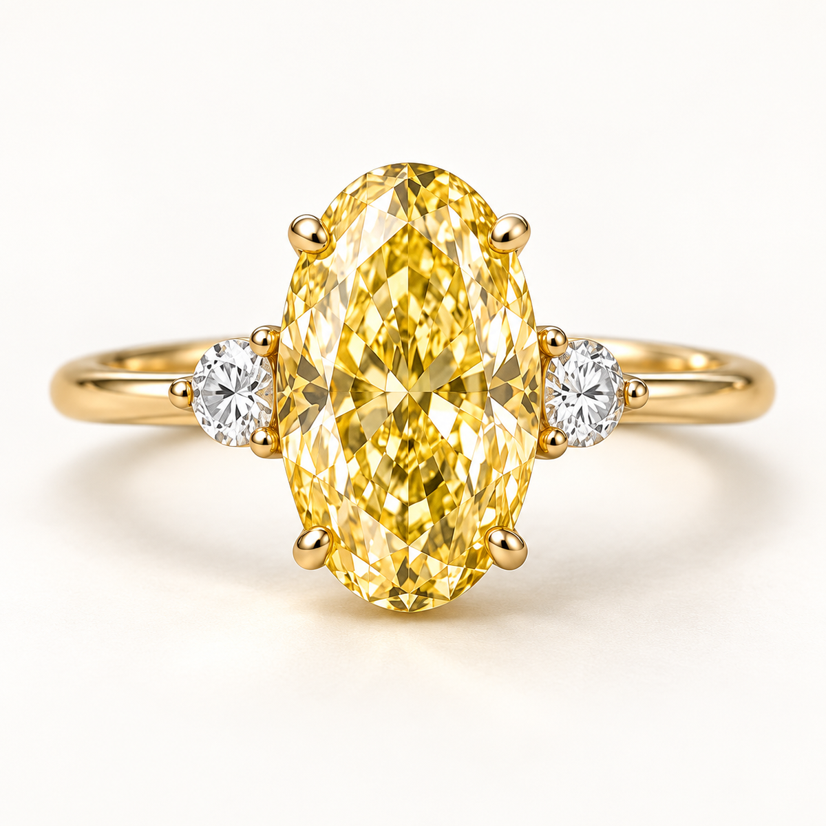 Design visualization of an oval lab-grown yellow diamond ring with one round lab-grown diamond on each side and a slender band