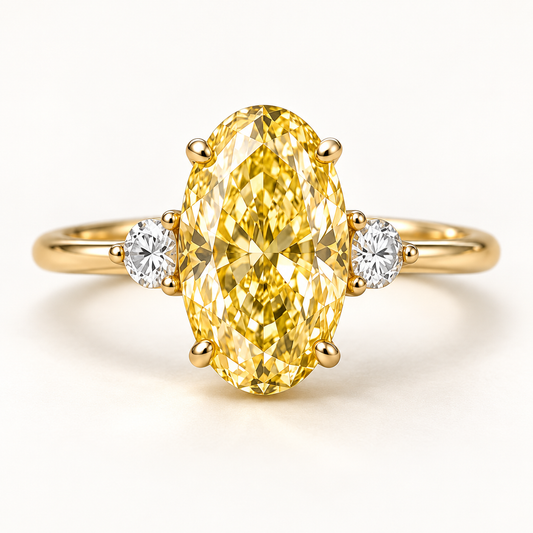 Design visualization of an oval lab-grown yellow diamond ring with one round lab-grown diamond on each side and a slender band