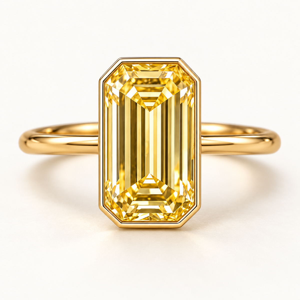 Design visualization of a vertically set emerald-cut lab-grown yellow diamond ring with a continuous bezel-style border and a plain band
