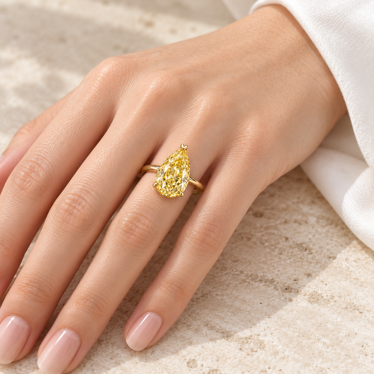 MISSISSI YR08 yellow lab-grown diamond ring, illustrative on-hand styling on a light-skinned adult hand; not a scale guide. Design visualization.