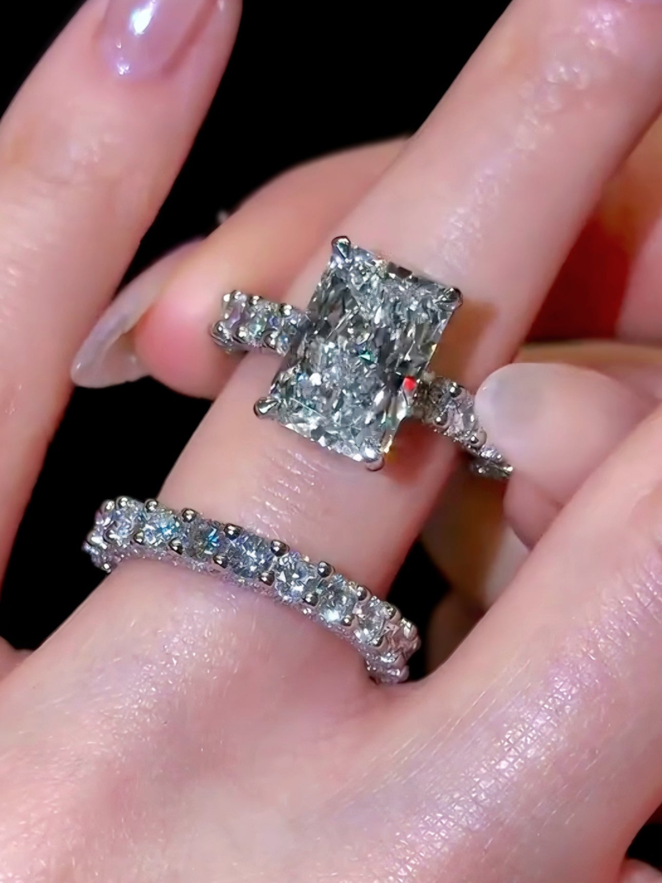 Premium radiant cut diamond wedding band on female finger celebrity style