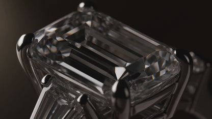 MISSISSI Emerald cut Prong-set center with two tapered baguette side stones ring advertisement. AI-generated design concept with champagne packaging.
