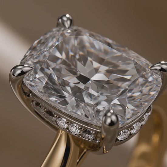 MISSISSI Elongated cushion brilliant Four-prong hidden halo ring advertisement. AI-generated design concept with champagne packaging.