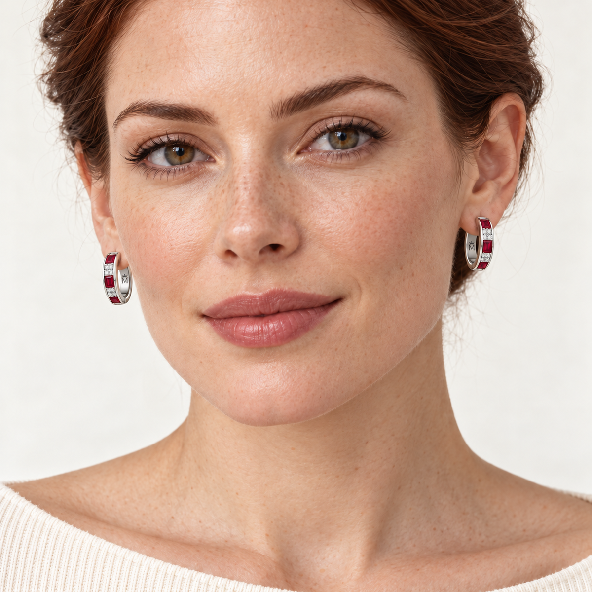 MISSISSI RB38 SCARLET ARC ruby hoop earrings worn by an adult model, white metal model light skin; design visualization