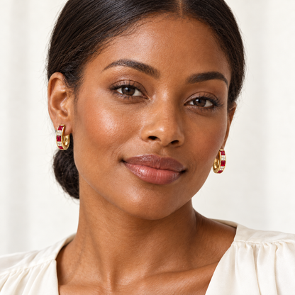 MISSISSI RB38 SCARLET ARC ruby hoop earrings worn by an adult model, yellow gold model deep skin; design visualization