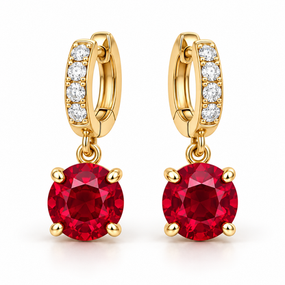 MISSISSI ME05 round lab-grown ruby drops on lab-grown diamond huggie hoops in yellow gold, pair on a white background; design visualization
