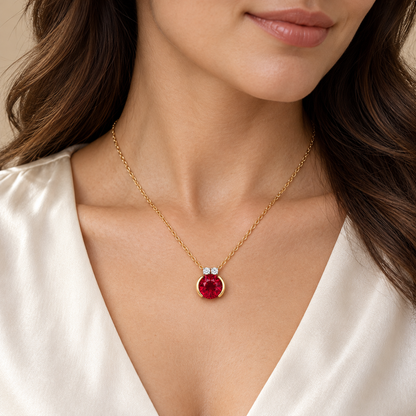Adult model wearing the MISSISSI MN05 round ruby necklace with two diamond accents, illustrative wearing scale
