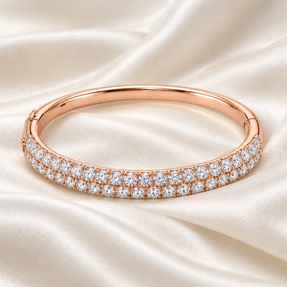 MISSISSI twin-row lab-grown diamond oval bangle in rose gold, styled on ivory silk