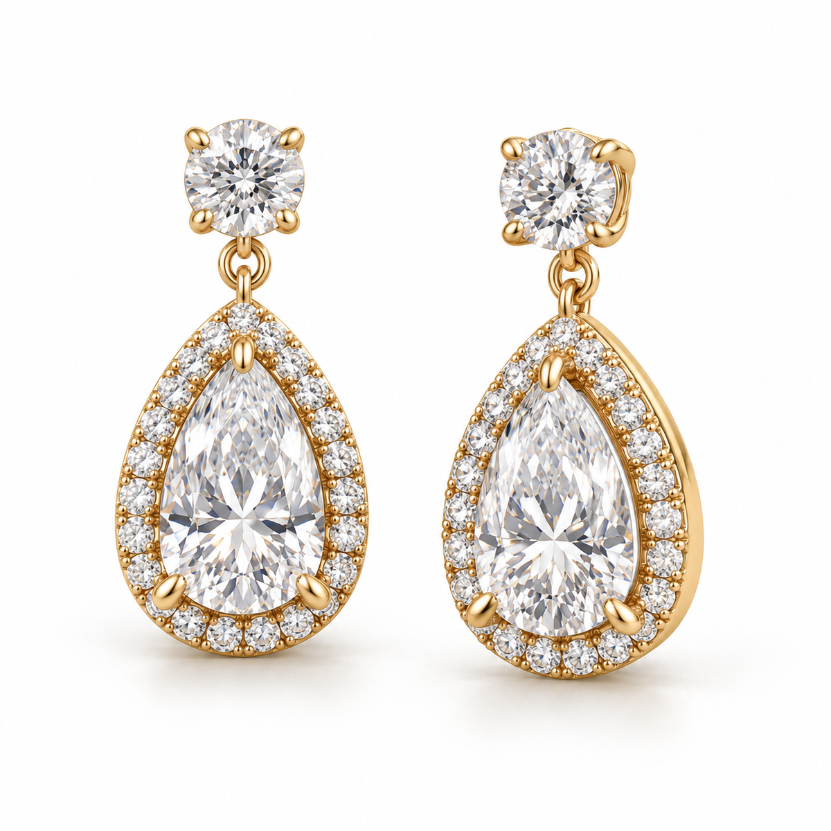 MISSISSI pear-halo lab-grown diamond drop earrings in yellow gold, matching pair in an oblique view