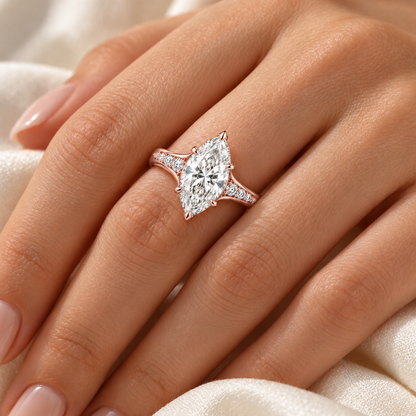 MISSISSI marquise lab-grown diamond cathedral ring in soft rose gold, worn scale view with graduated diamond shoulders.