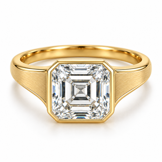MISSISSI Asscher lab-grown diamond bezel ring in yellow gold, front hero view with satin shoulders and polished edges.
