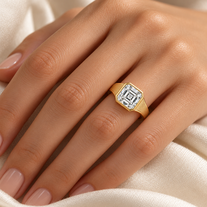 MISSISSI Asscher lab-grown diamond bezel ring in yellow gold, worn scale view with satin shoulders and polished edges.