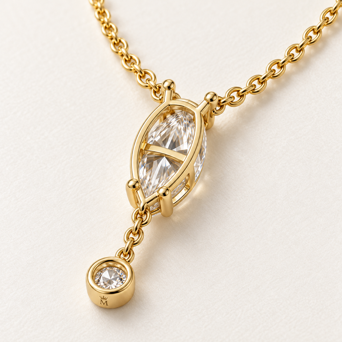 MISSISSI U08 Marquise Y Drop necklace in 14K yellow gold, rear setting and engraved bezel detail; design visualization with a vertical marquise diamond and a small round bezel-set diamond on a short chain drop.