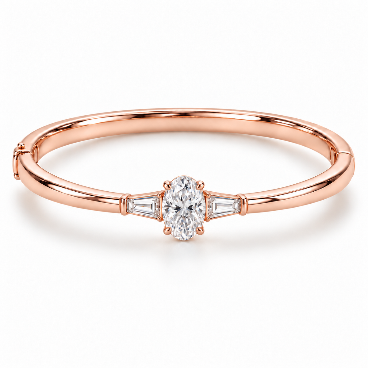 MISSISSI U09 Oval and Baguette bangle in 14K rose gold, front hero on white; design visualization of a closed oval bangle with a vertical oval diamond and two tapered baguette side diamonds.