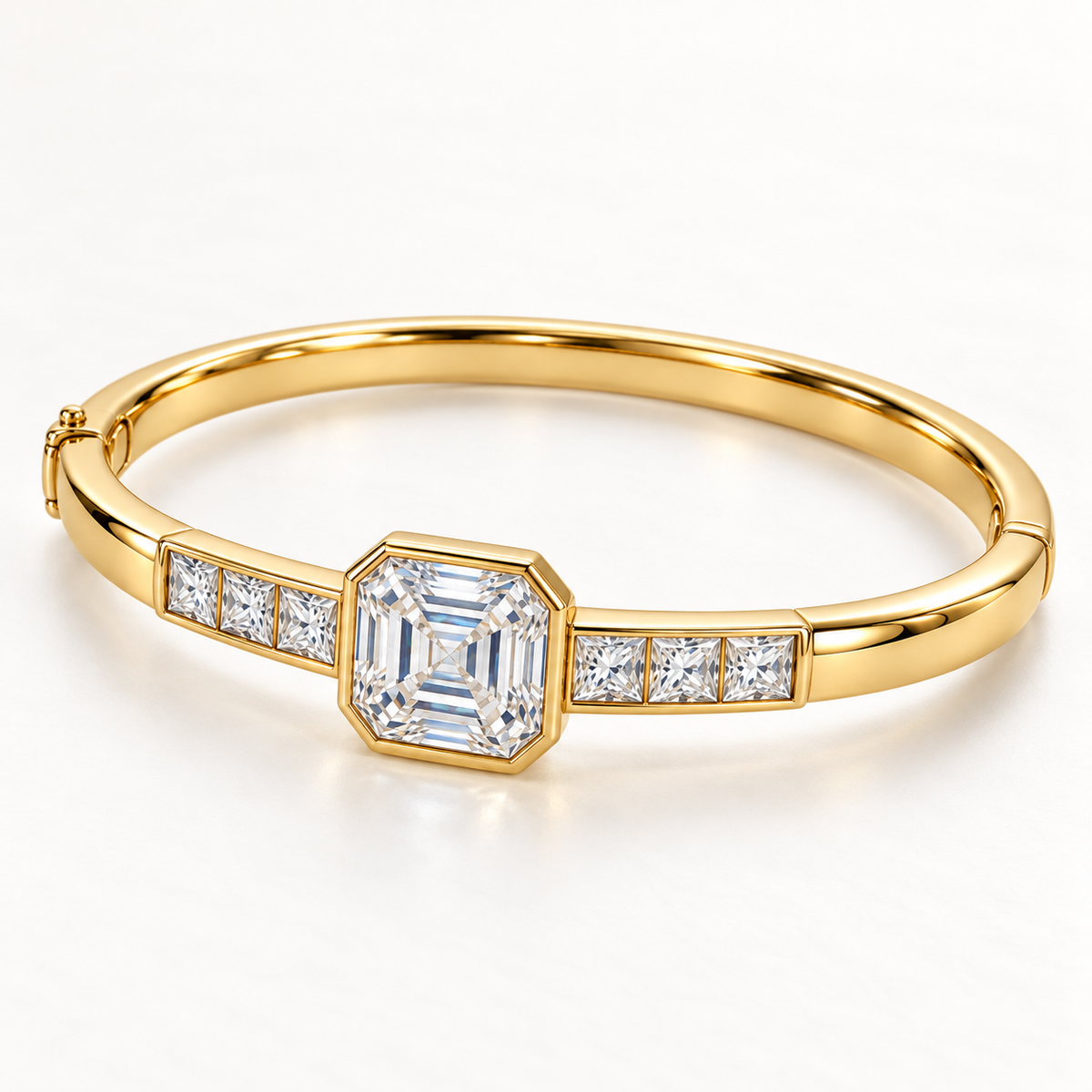 MISSISSI U10 Asscher-cut lab-grown diamond closed oval bangle in 14K yellow gold, three-quarter view, with three princess-cut diamonds on each shoulder.