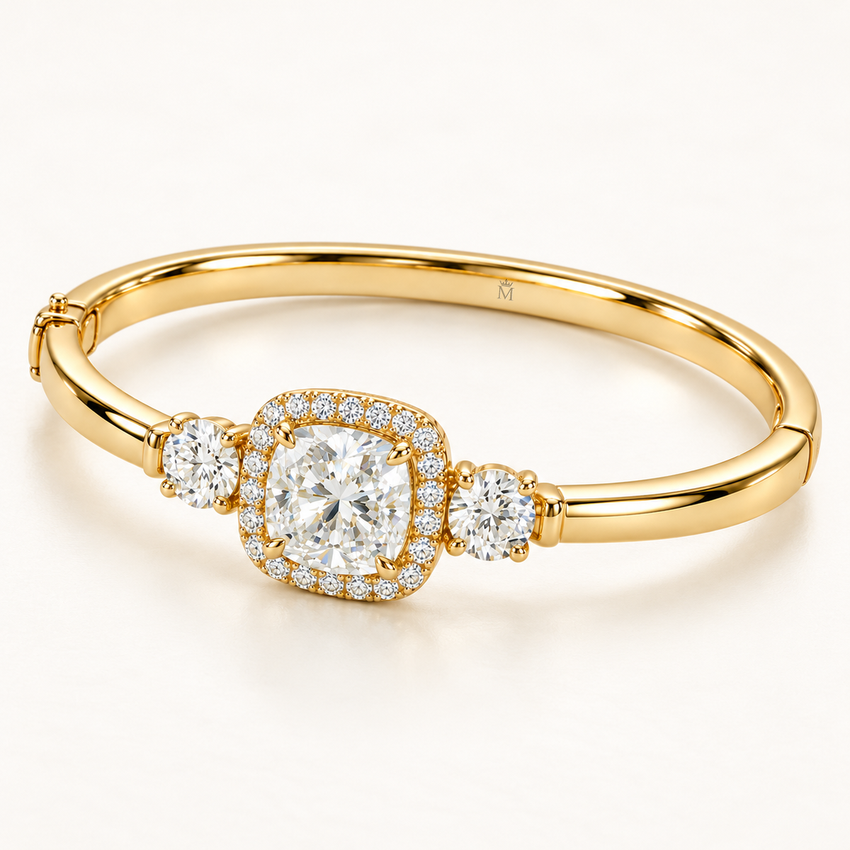 MISSISSI U11 cushion-cut lab-grown diamond halo closed oval bangle in 14K yellow gold, three-quarter view, with one round diamond on each shoulder.