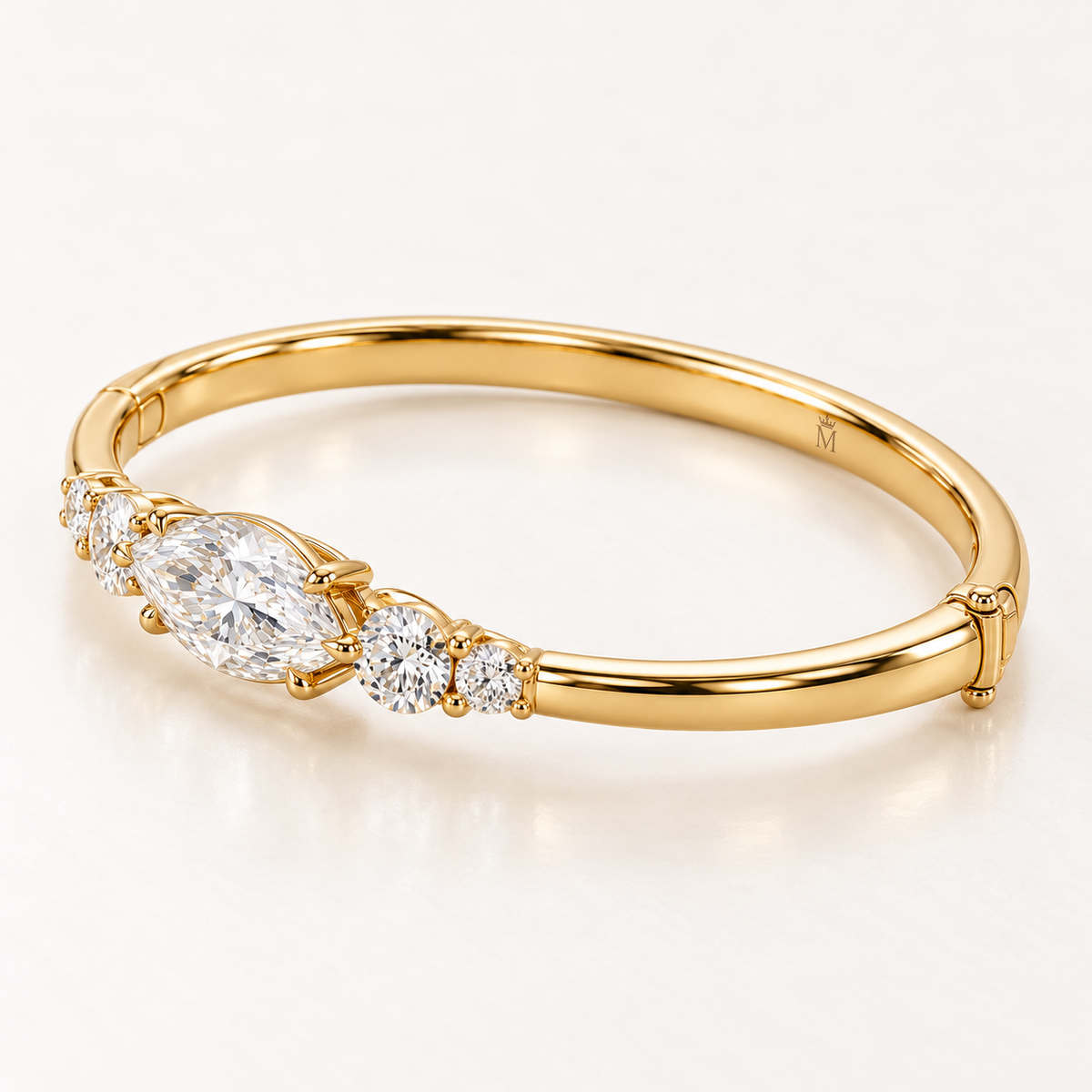 MISSISSI U12 east-west marquise-cut lab-grown diamond closed oval bangle in 14K yellow gold, side-profile, inner-band and clasp view, with two graduated round diamonds on each shoulder.