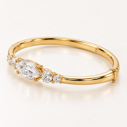 MISSISSI U12 east-west marquise-cut lab-grown diamond closed oval bangle in 14K yellow gold, side-profile, inner-band and clasp view, with two graduated round diamonds on each shoulder.