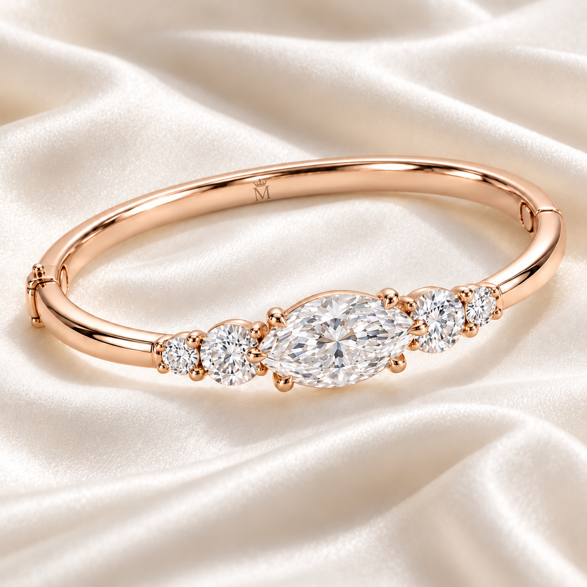 MISSISSI U12 east-west marquise-cut lab-grown diamond closed oval bangle in 14K soft rose gold, ivory silk still life, with two graduated round diamonds on each shoulder.