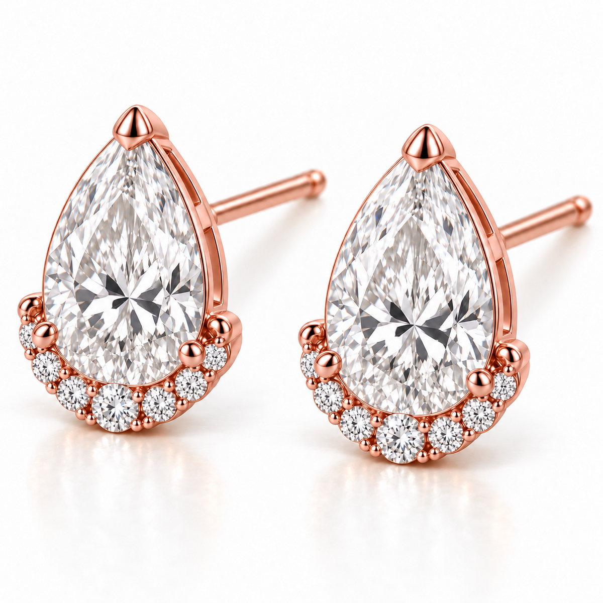 MISSISSI Pear Diamond Jacket lab-grown diamond earrings in 14K rose gold, three-quarter view.