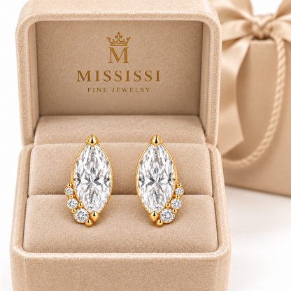 MISSISSI Marquise Curl lab-grown diamond earrings in 14K yellow gold, branded jewelry box presentation.